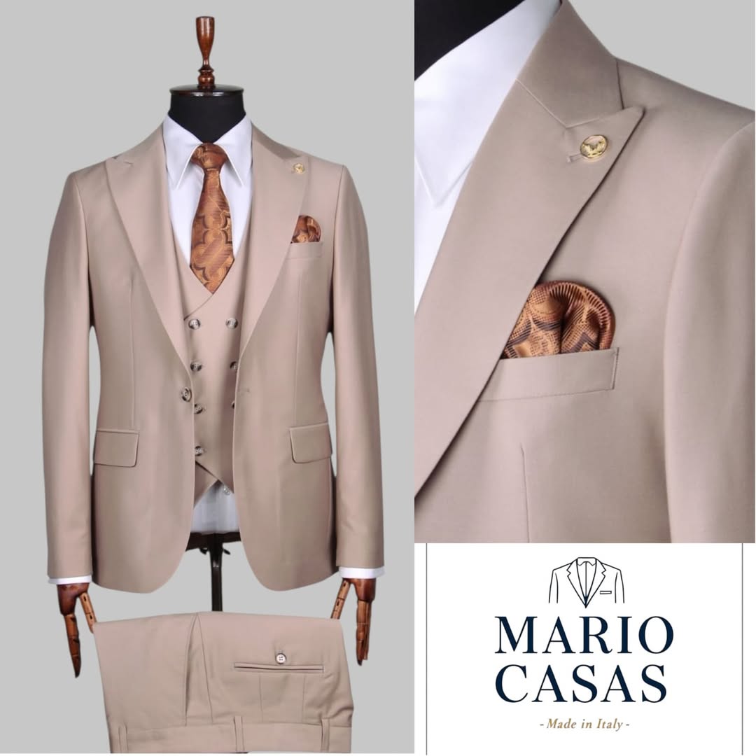 Elegant Light Tan Three-Piece Suit. .