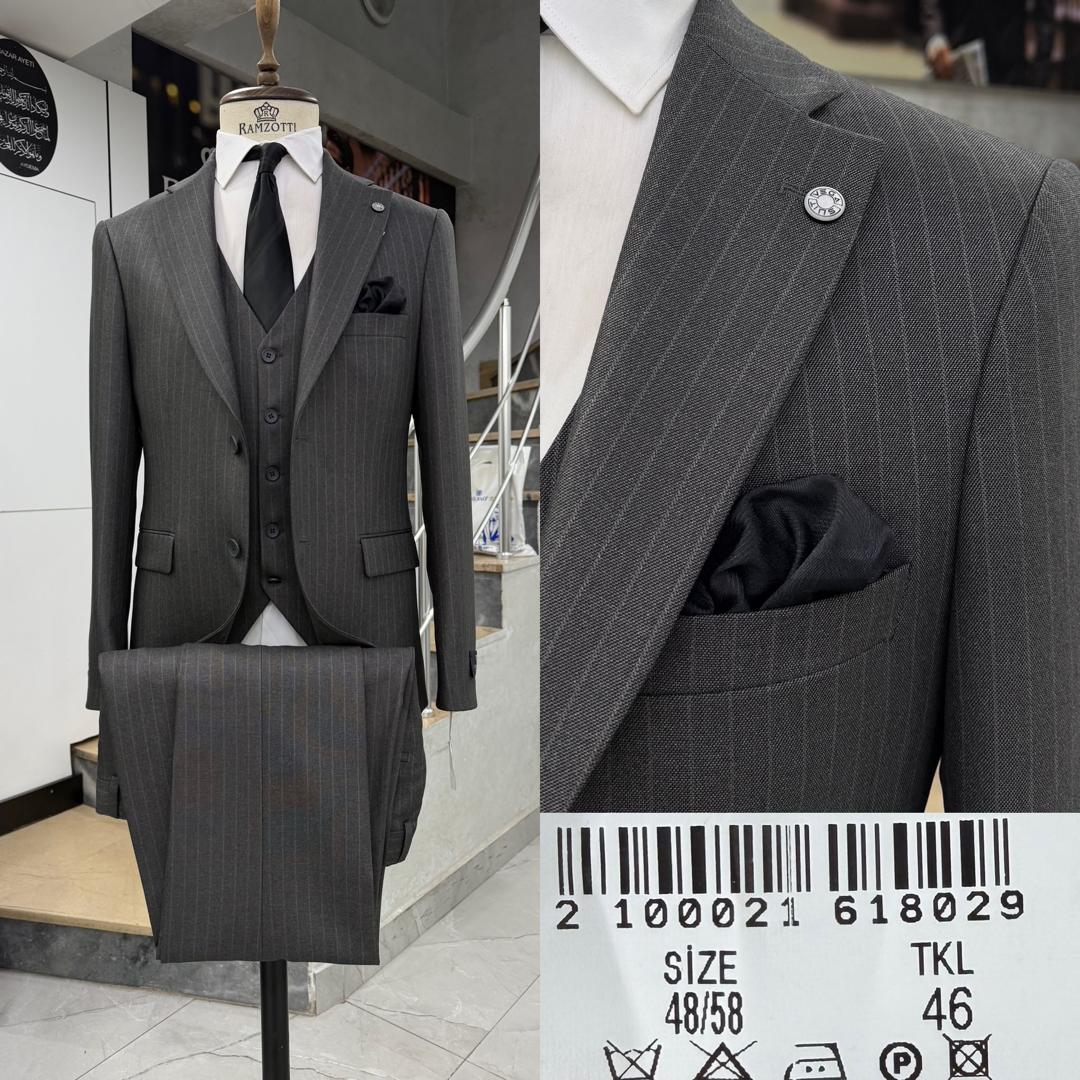 Sophisticated Three-Piece Suit .