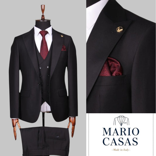 Sophisticated Charcoal Black Three-Piece Suit .