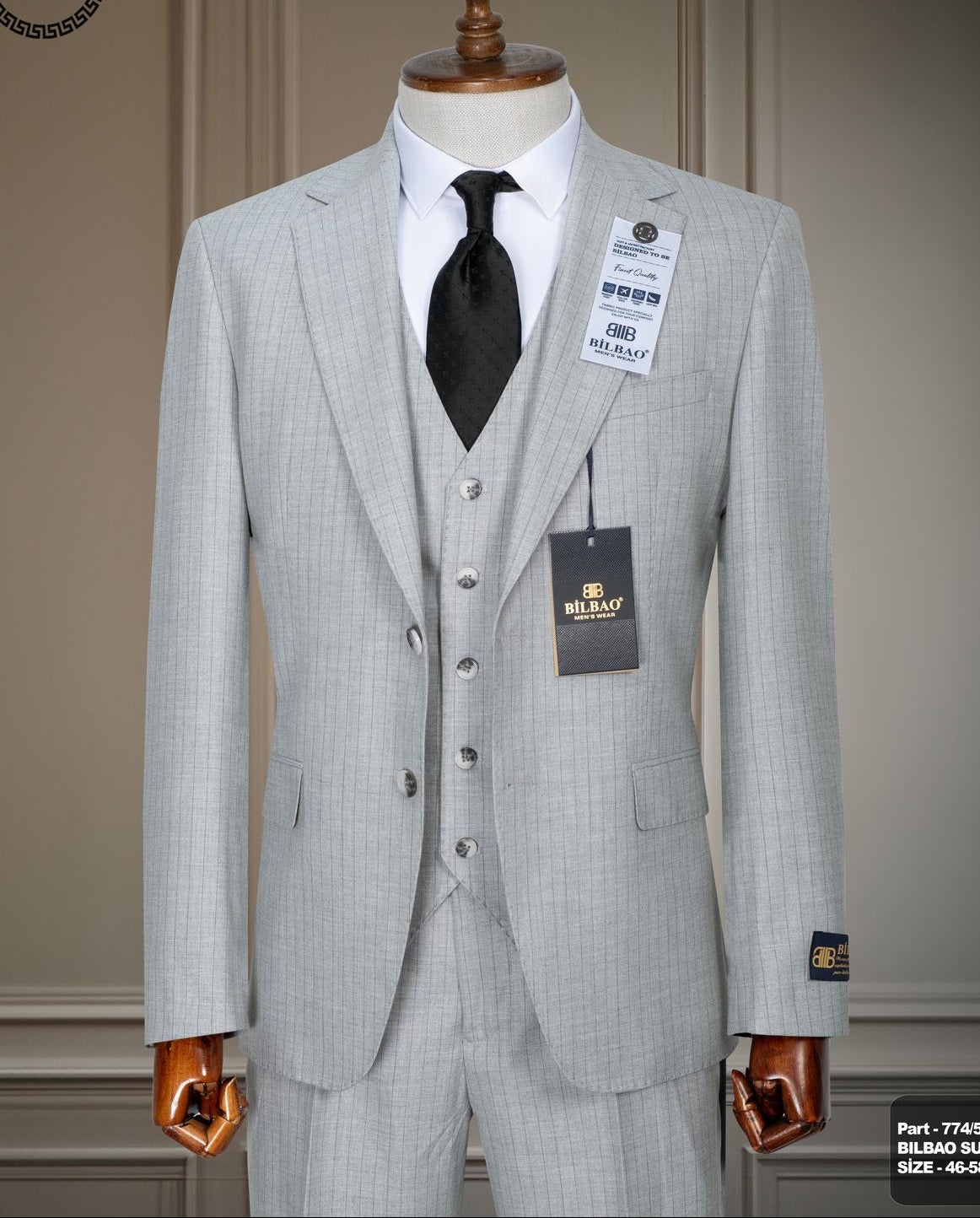 Pin Stripe Three-Piece Suit.