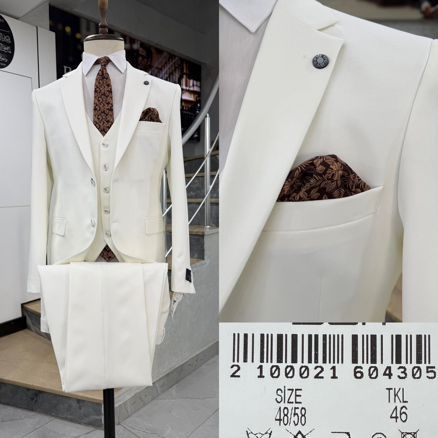 Sophisticated Two Button Three-Piece Suit .