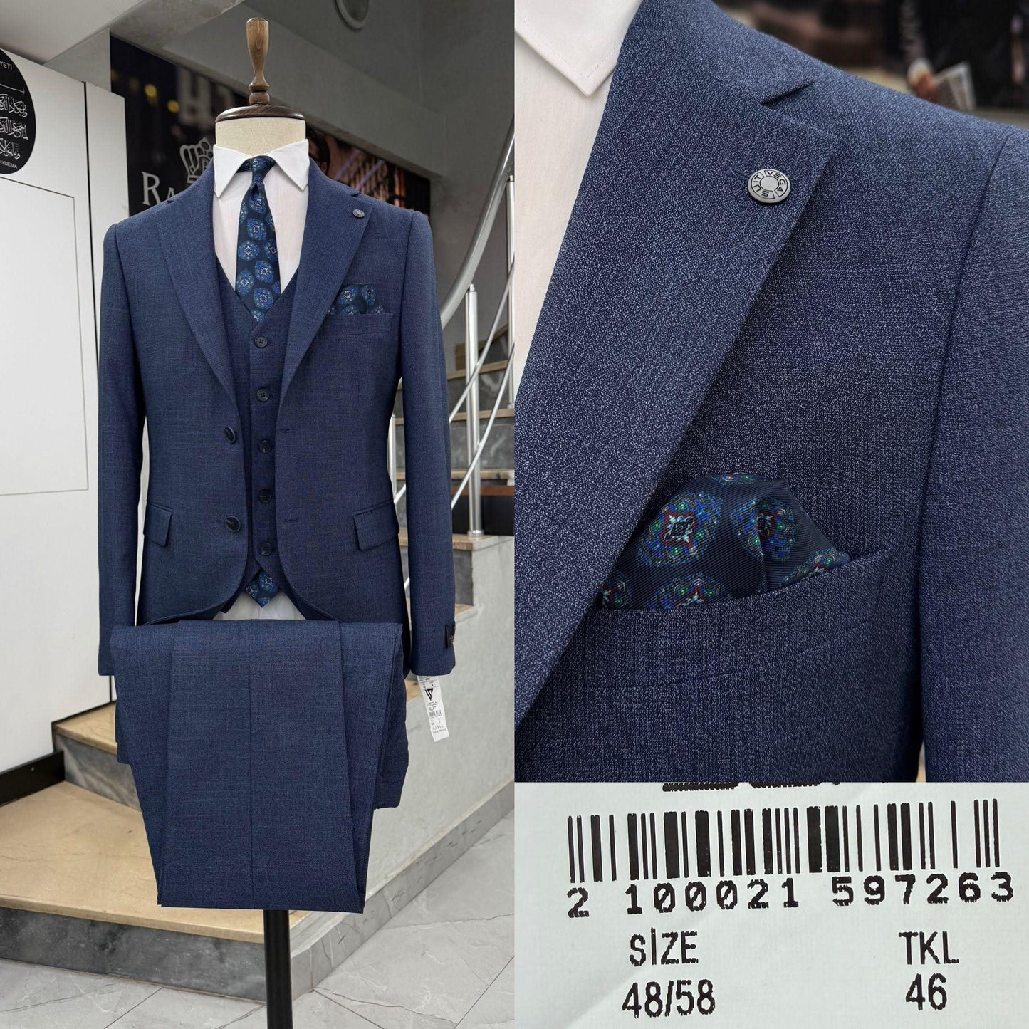 Sophisticated Two Button Three-Piece Suit .